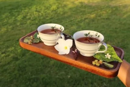 a plate of food and a cup of coffee